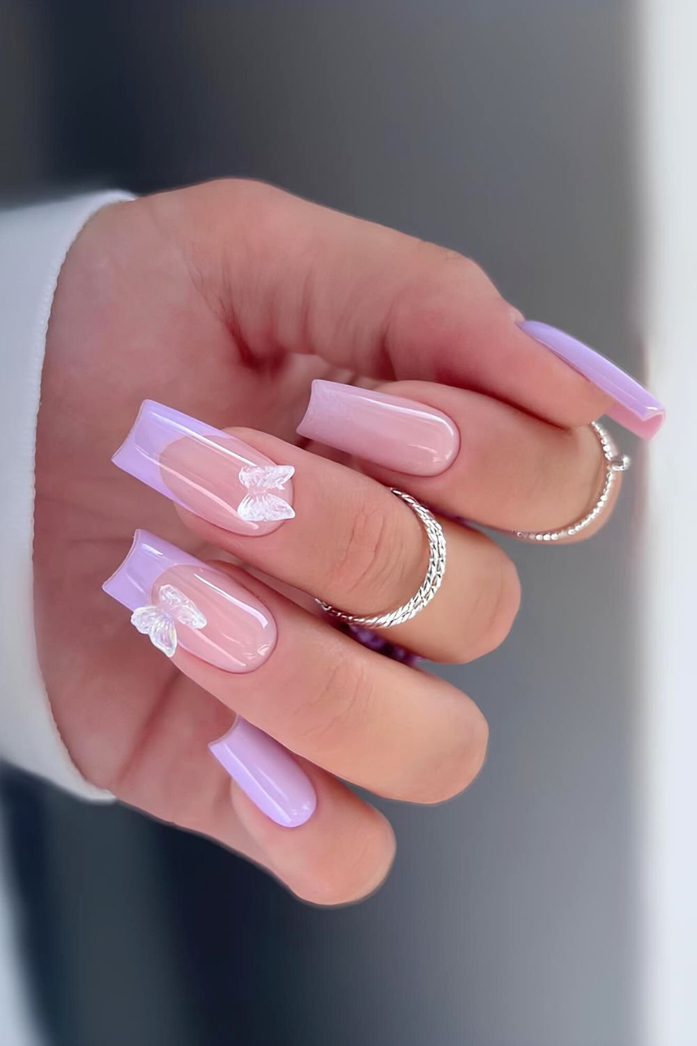 Lavender French nails with 3d butterfly accents