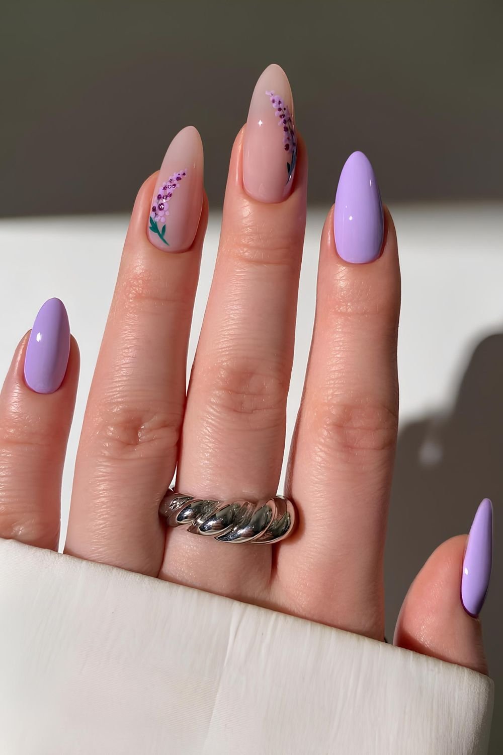Lavender nails with floral accents