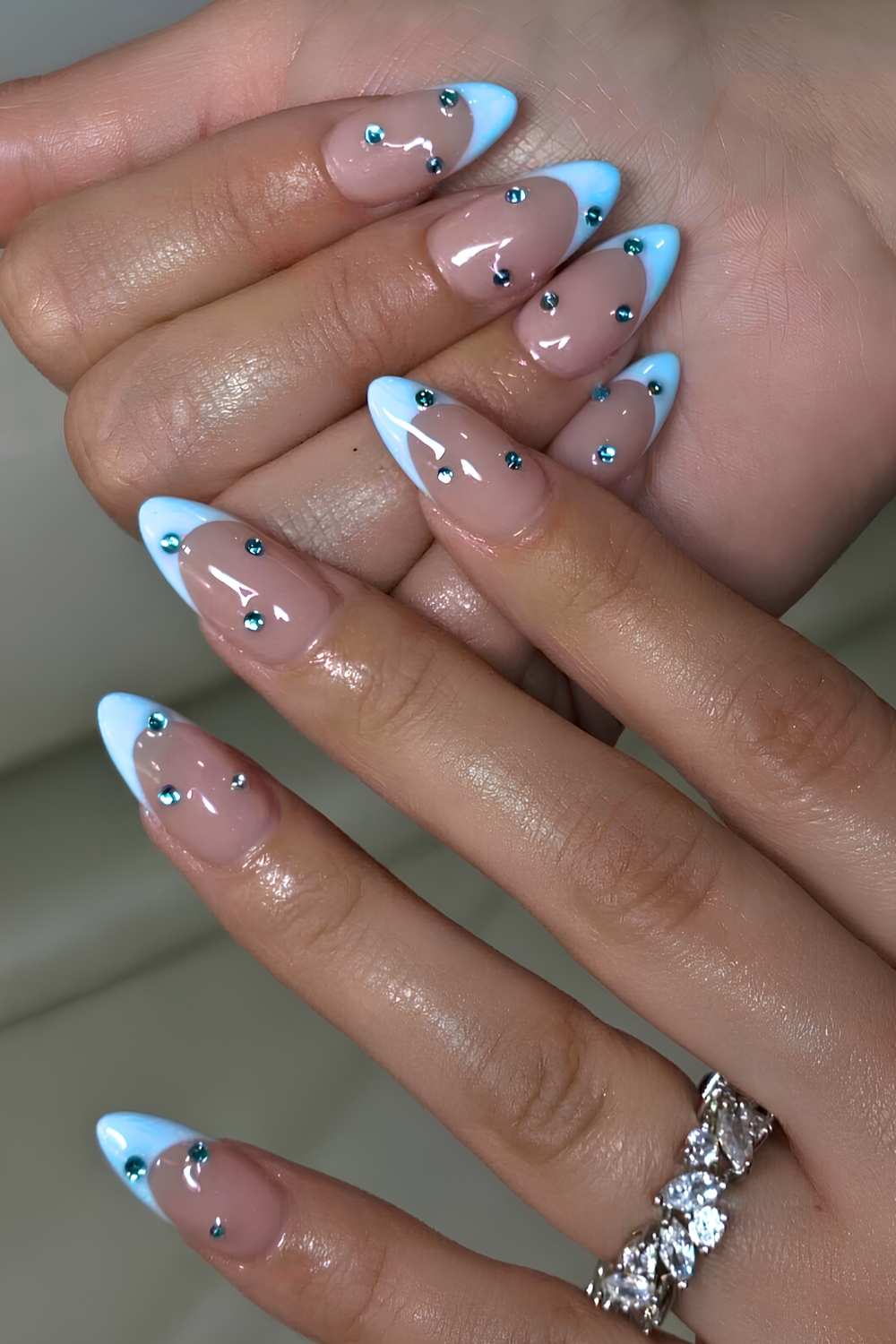 Light blue French mani with crystals