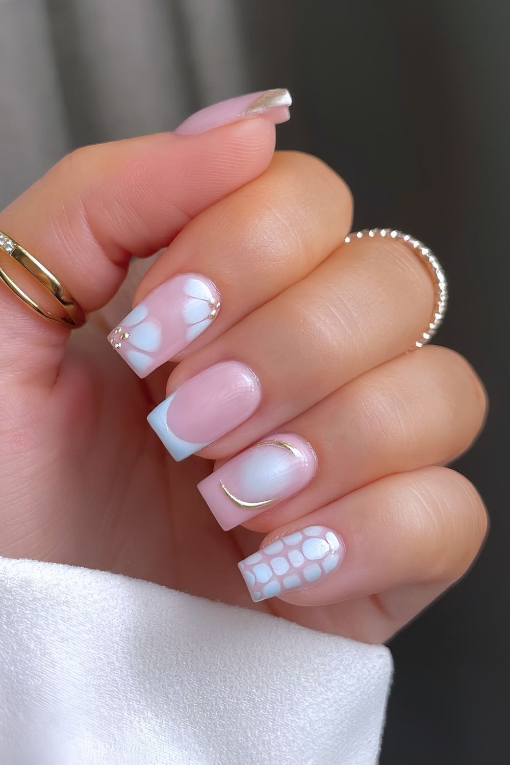 Light blue mix and match nails