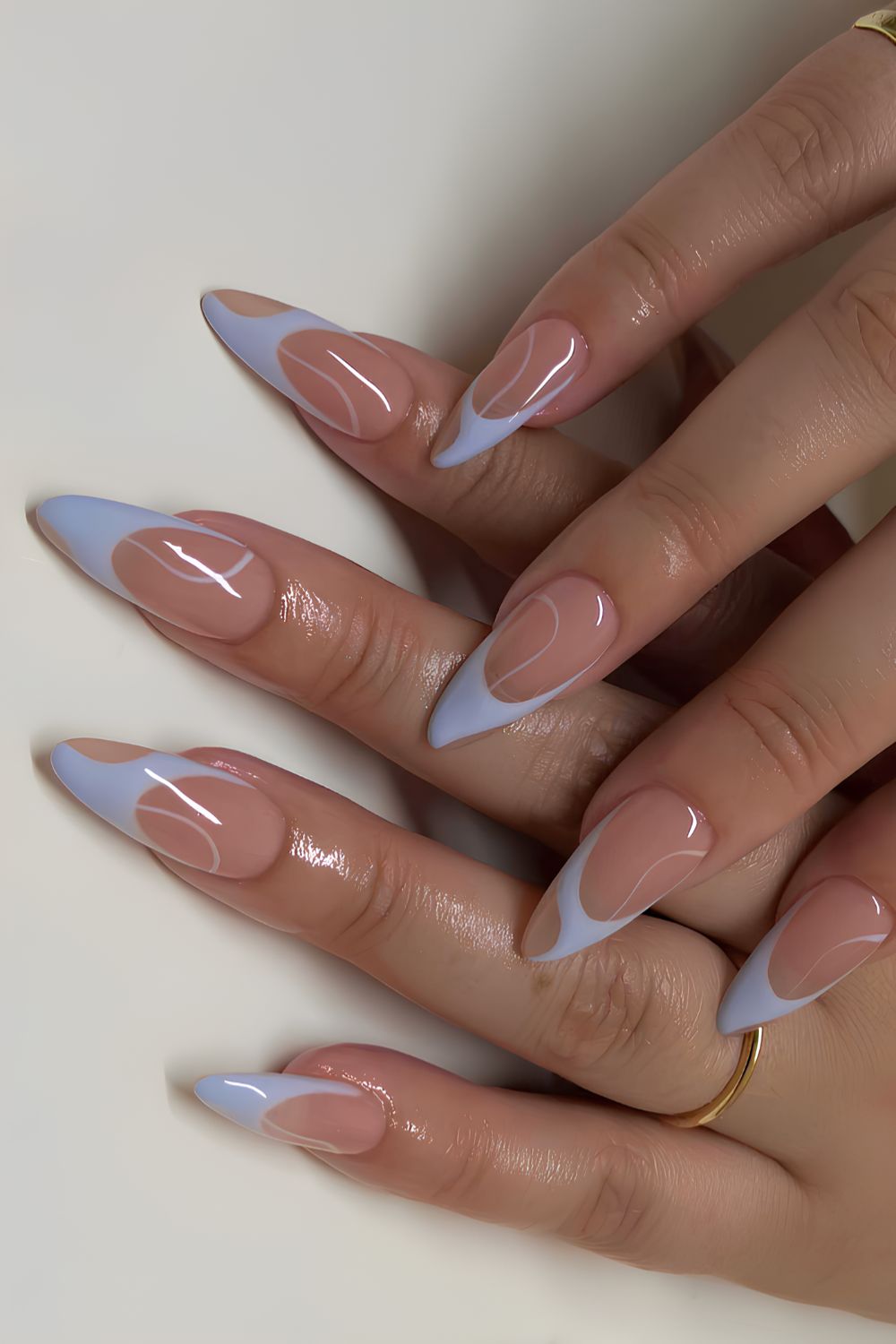 Light blue swirly French manicure