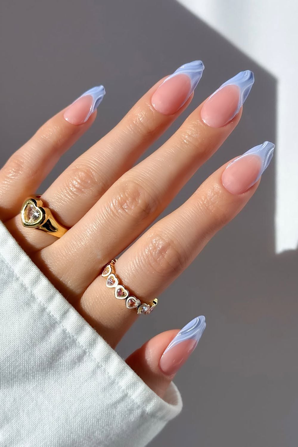 Light blue textured French tip nails