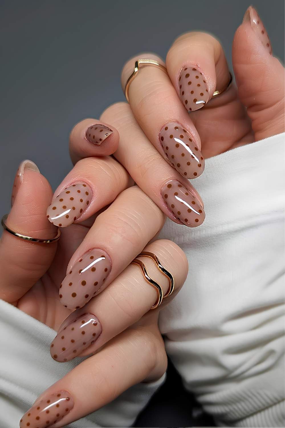 Light brown polka dot nails