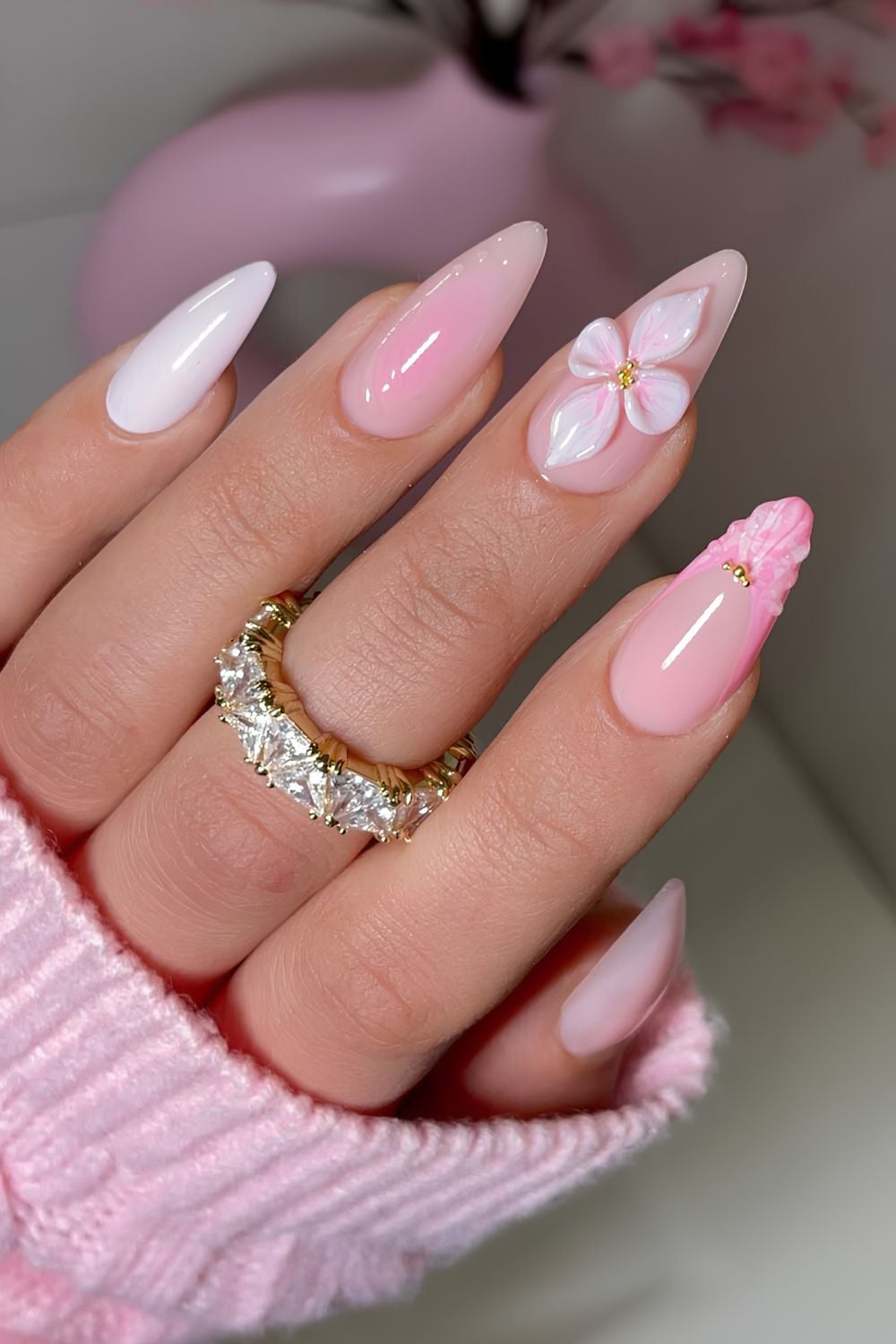 Light pink and white nails with sculpted flowers