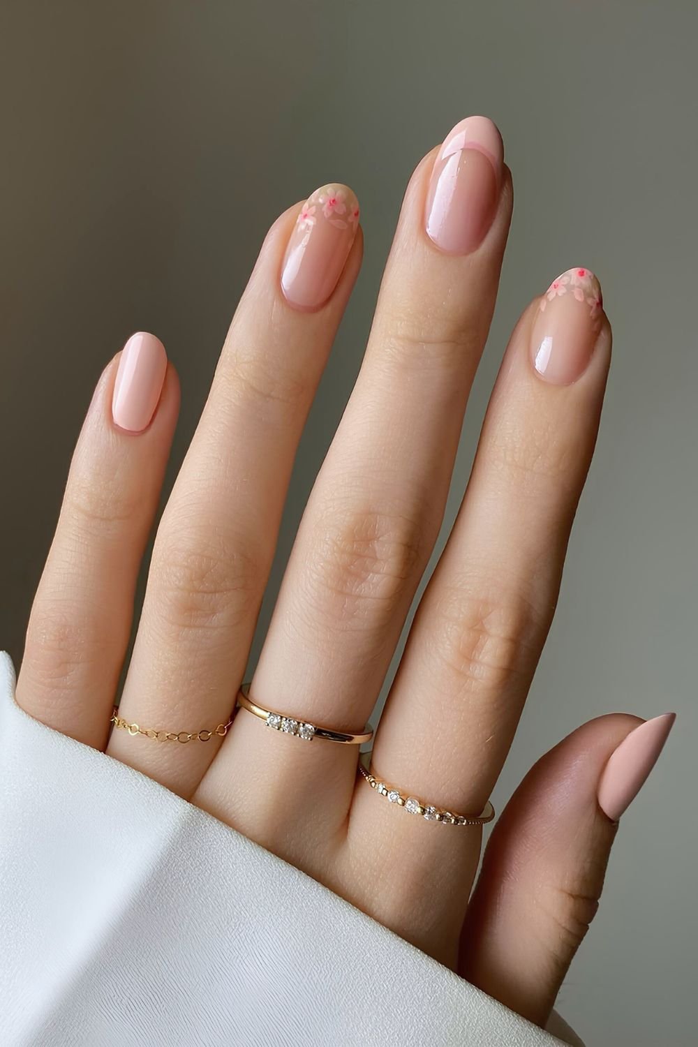 Light pink nails with cherry blossoms