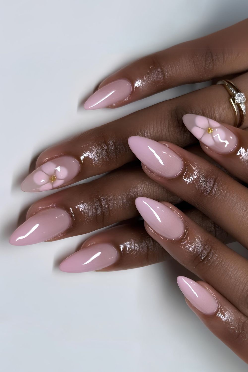 Light pink ombre nails with blooming flowers