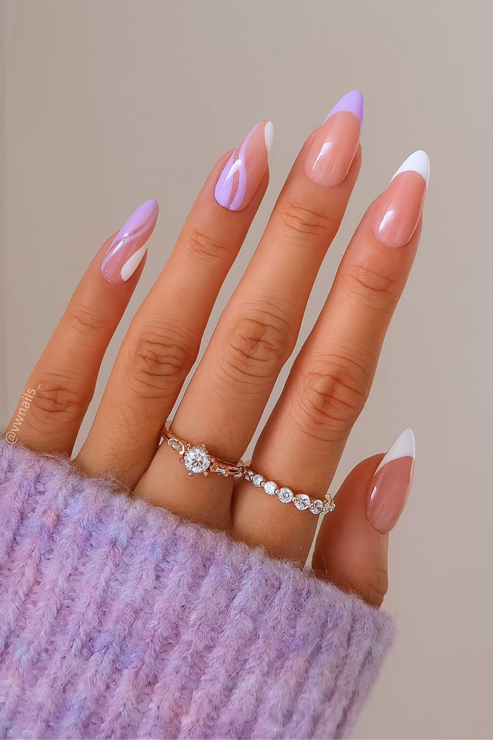 Light purple and white French nails with swirls