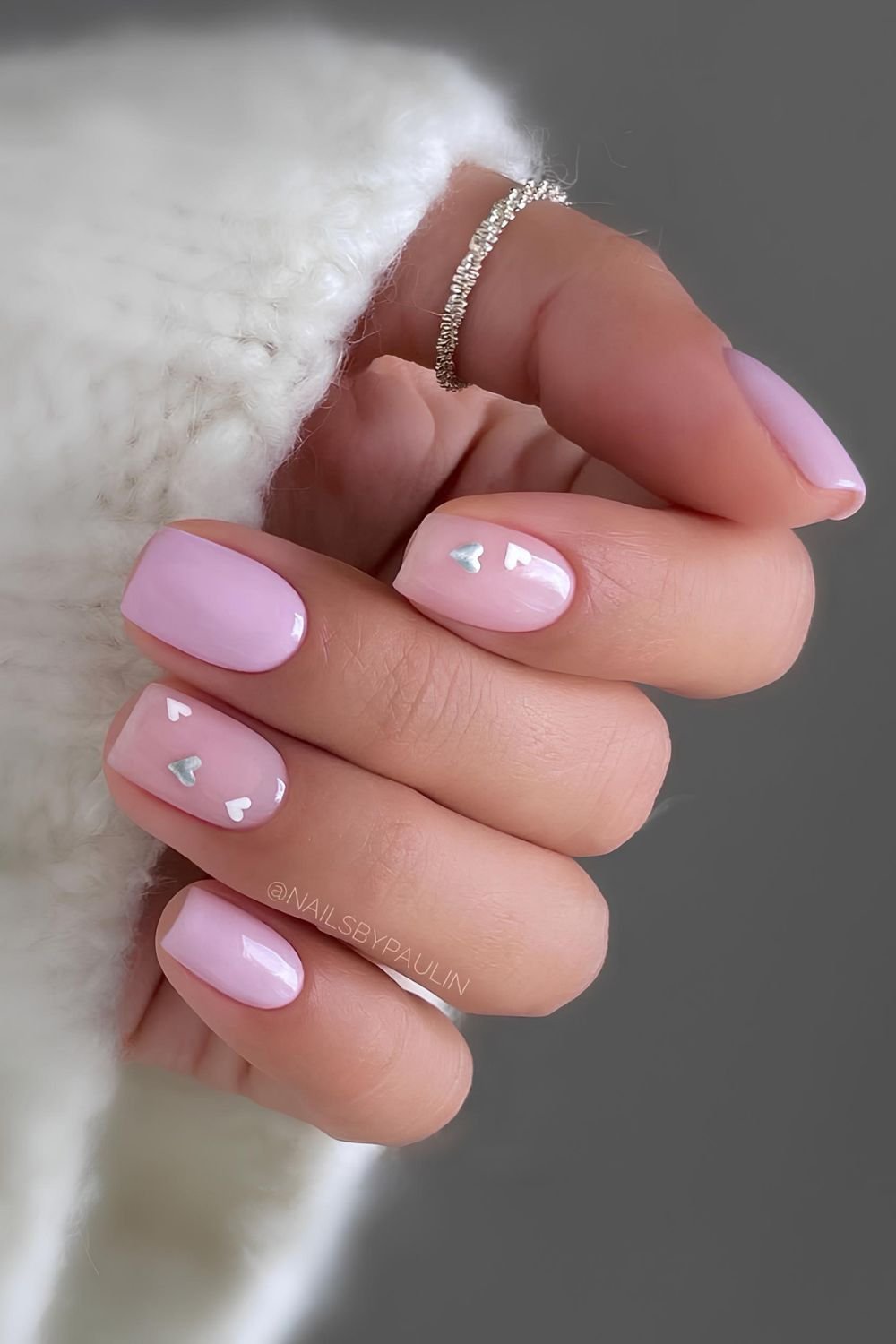 Lilac nails with tiny heart accents