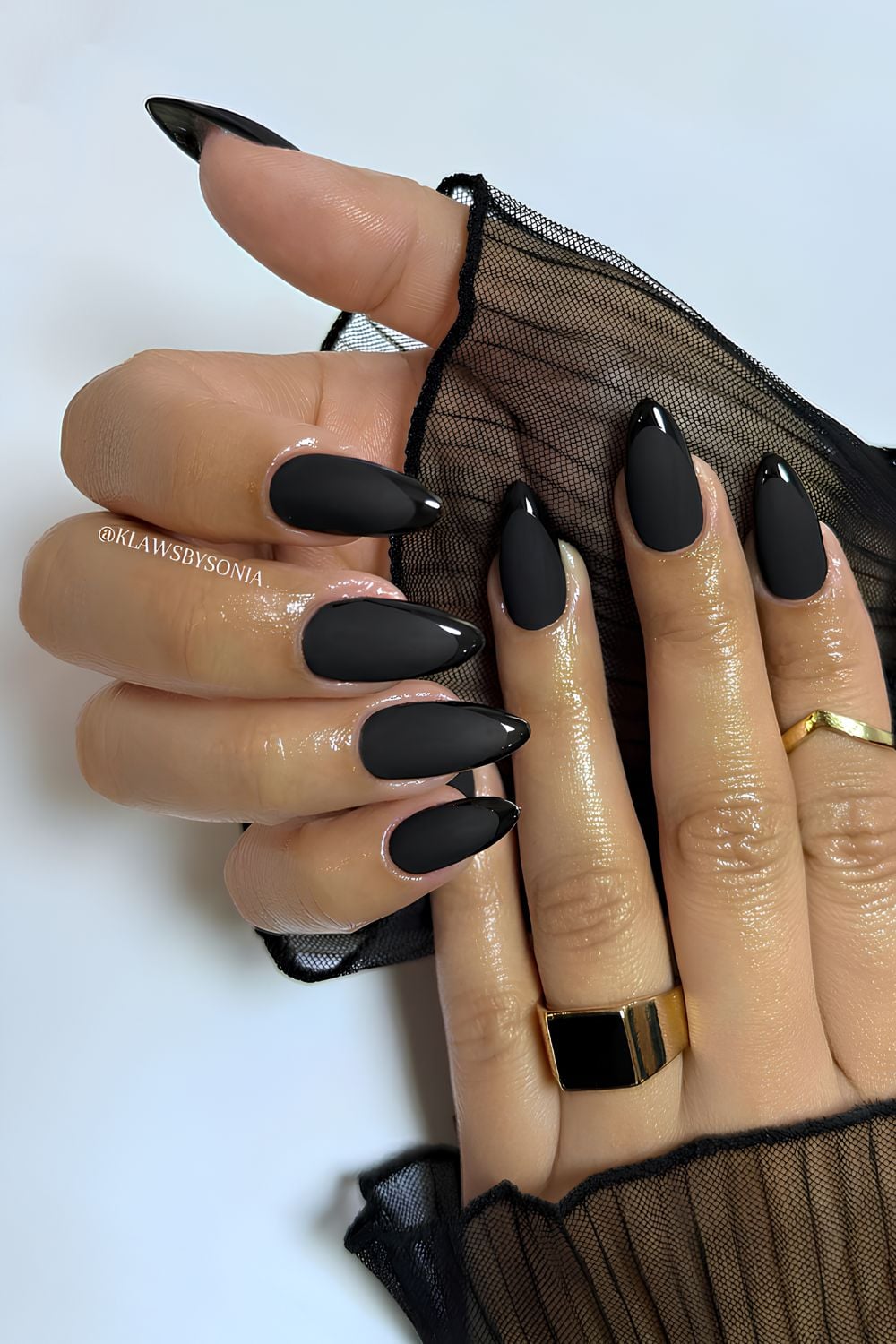 Matte black nails with glossy French tips