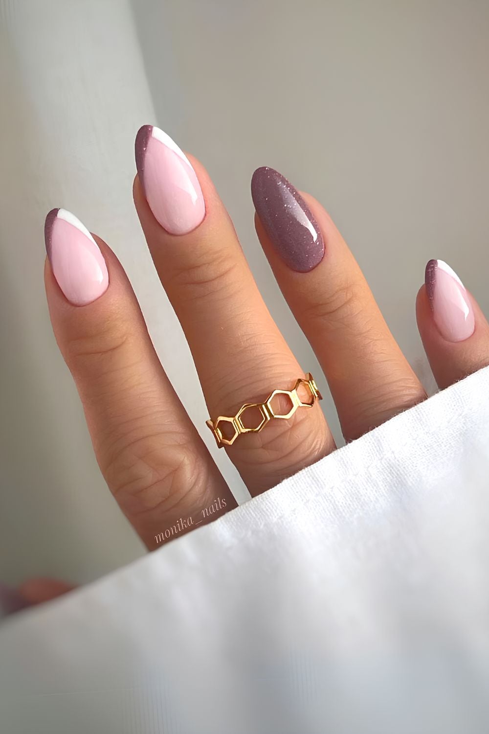 Mauve and white pointed French nails