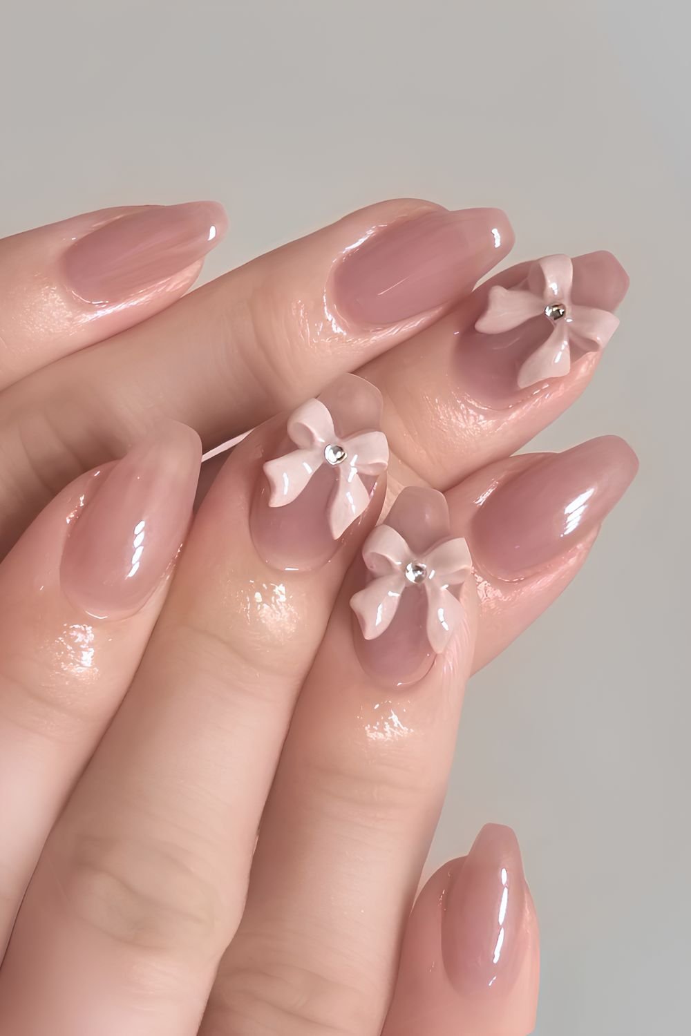 Mauve coquette nails with bows