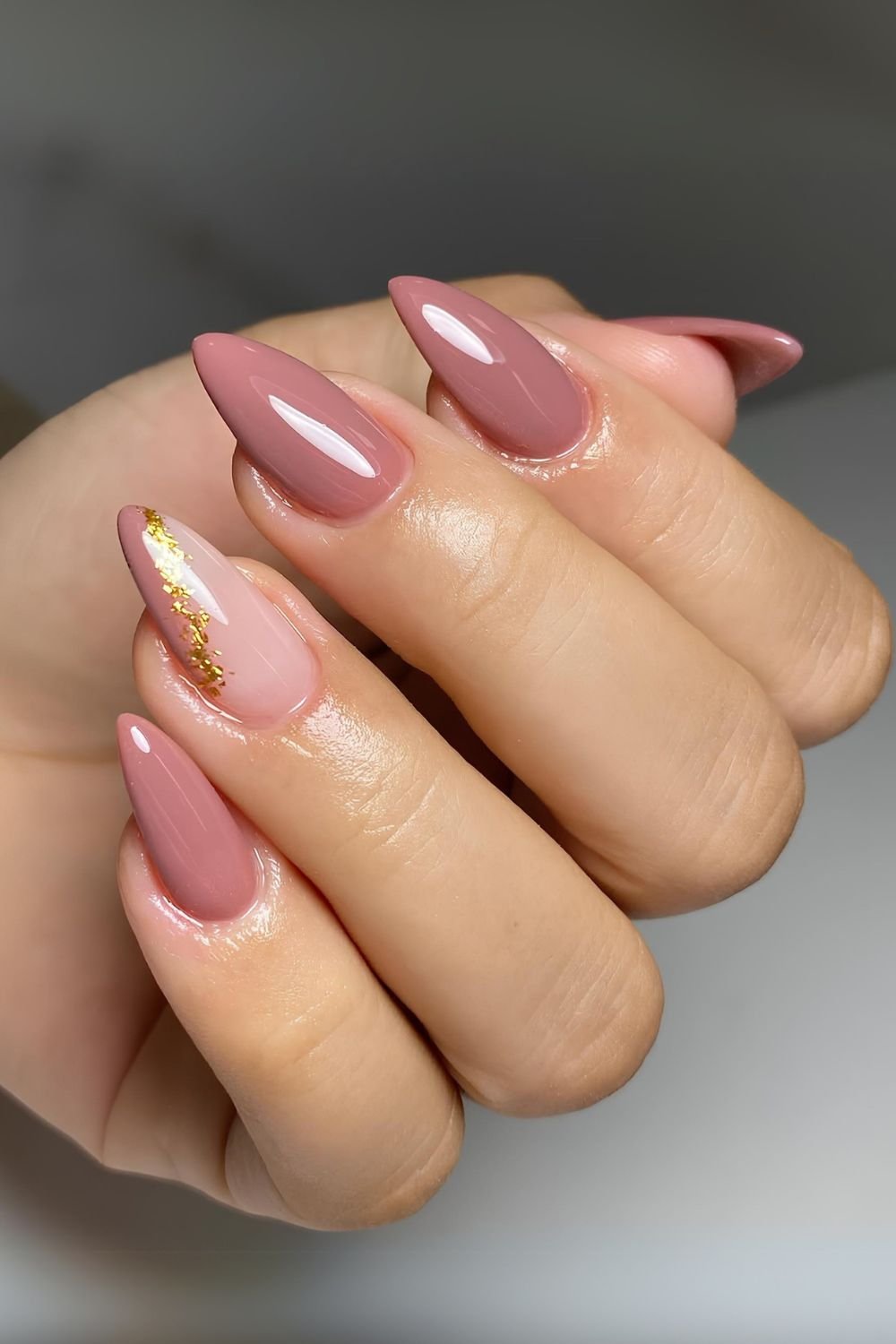 Mauve nails with gold foil accent