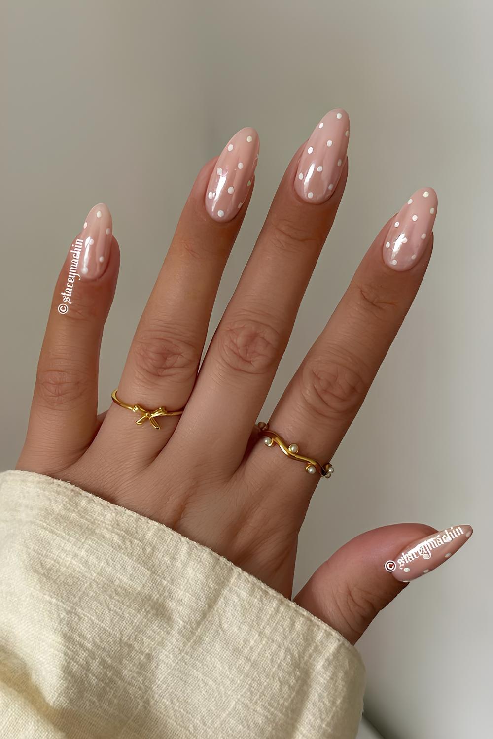 Milky chrome nails with polka dot art