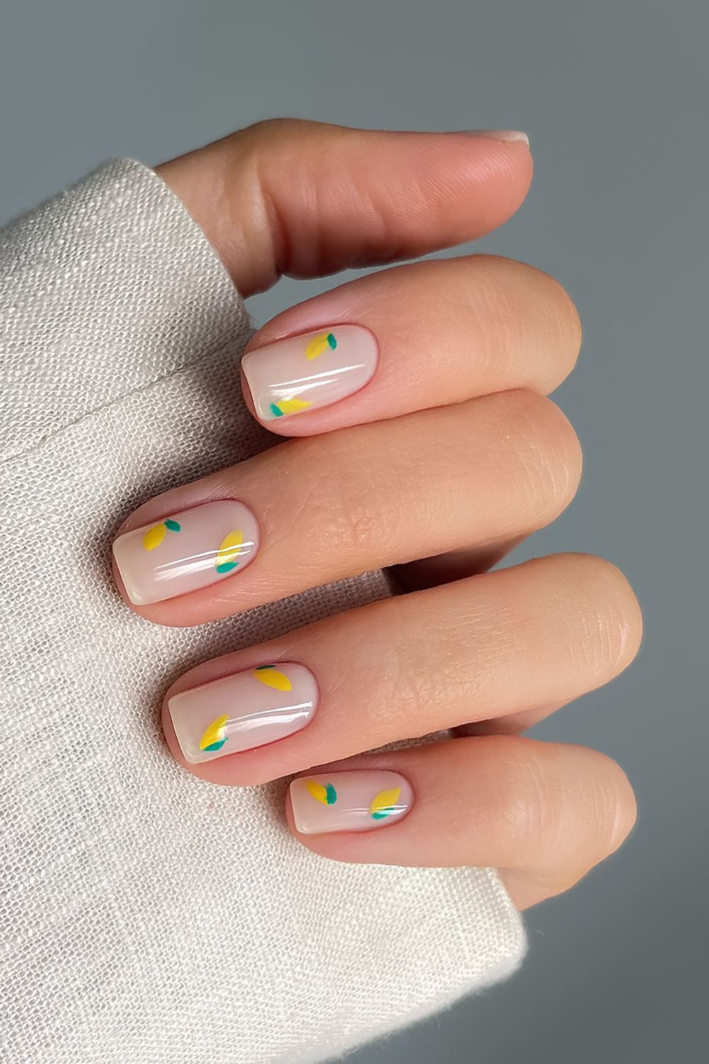 Milky mani with tiny lemon art