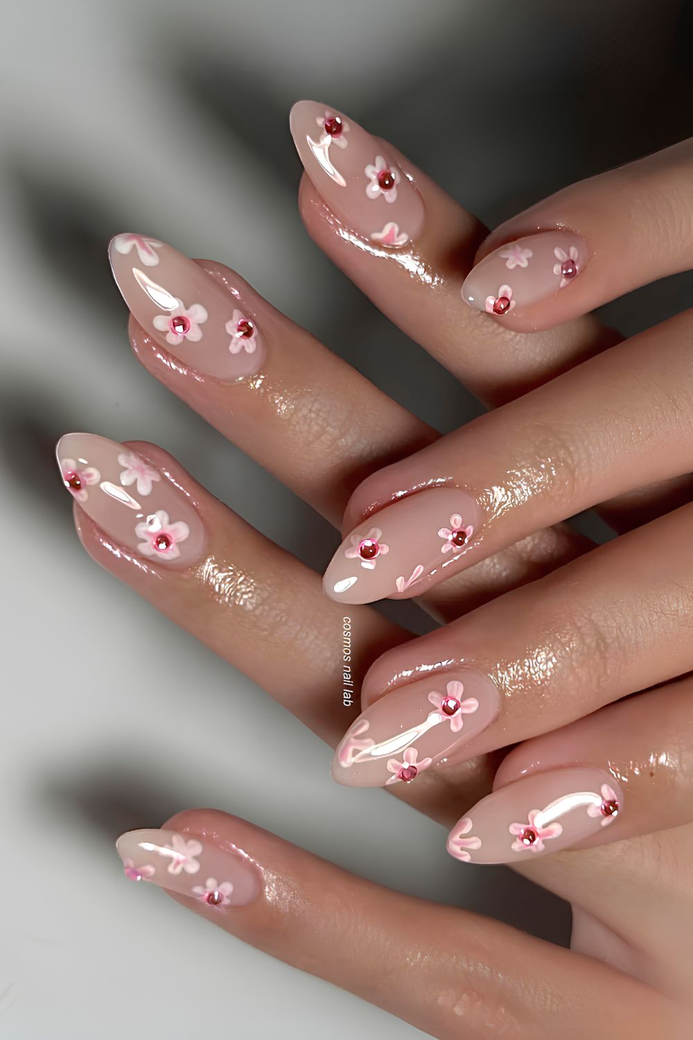 Milky nails with cherry blossoms and rhinestones