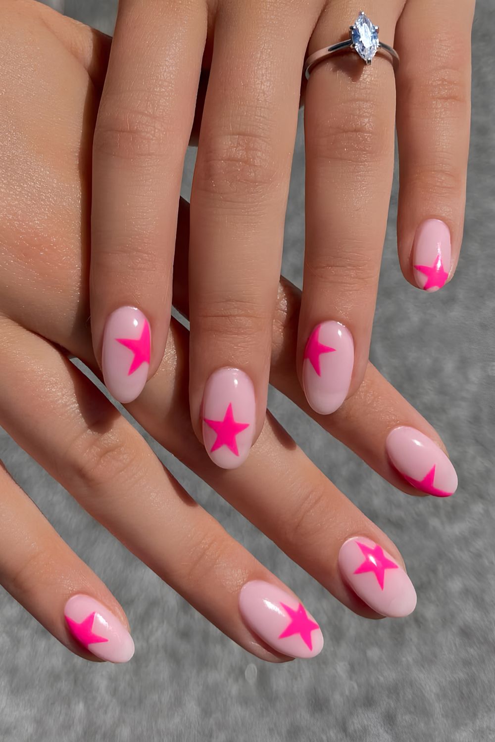 Milky nails with hot pink star art