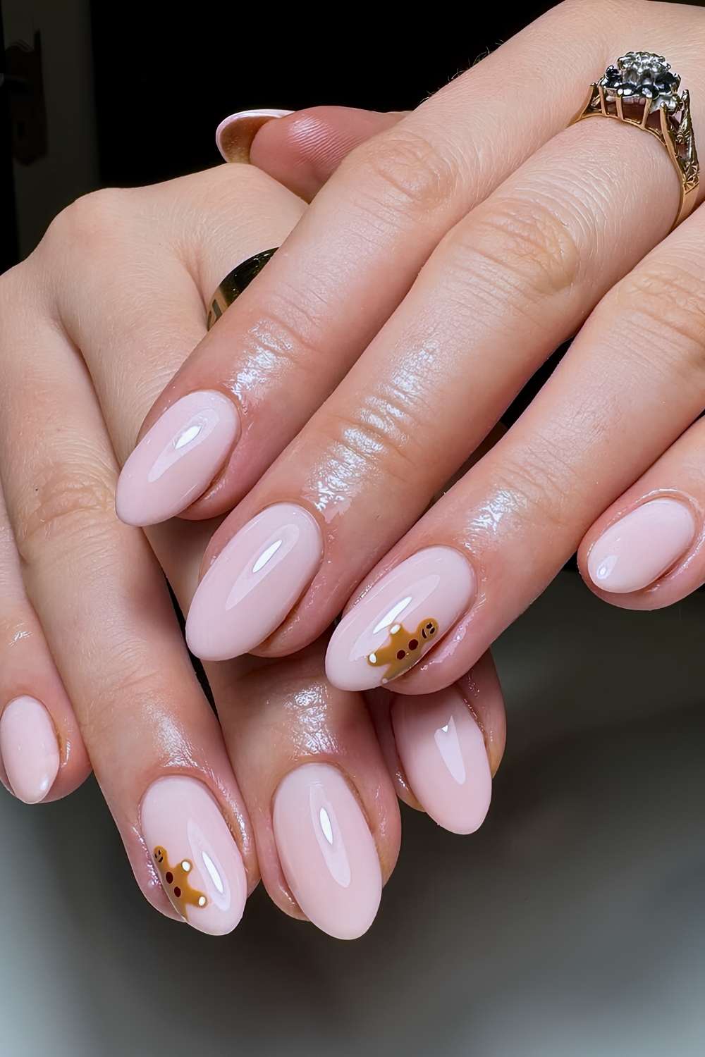 Milky nails with minimalist gingerbread cookie art