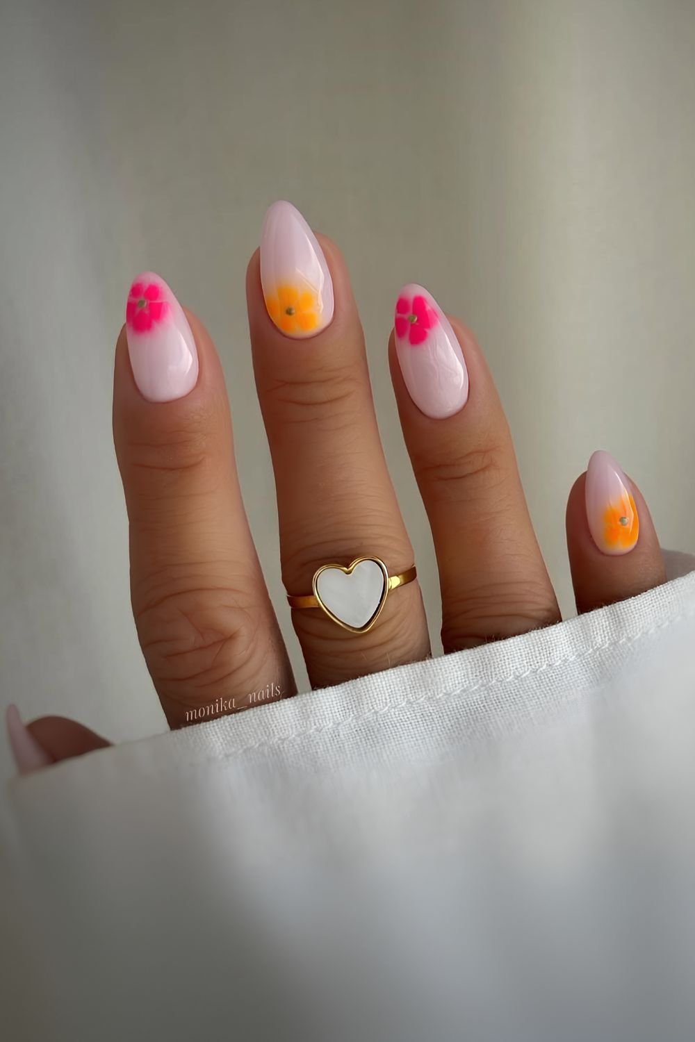 Milky nails with neon blooming florals