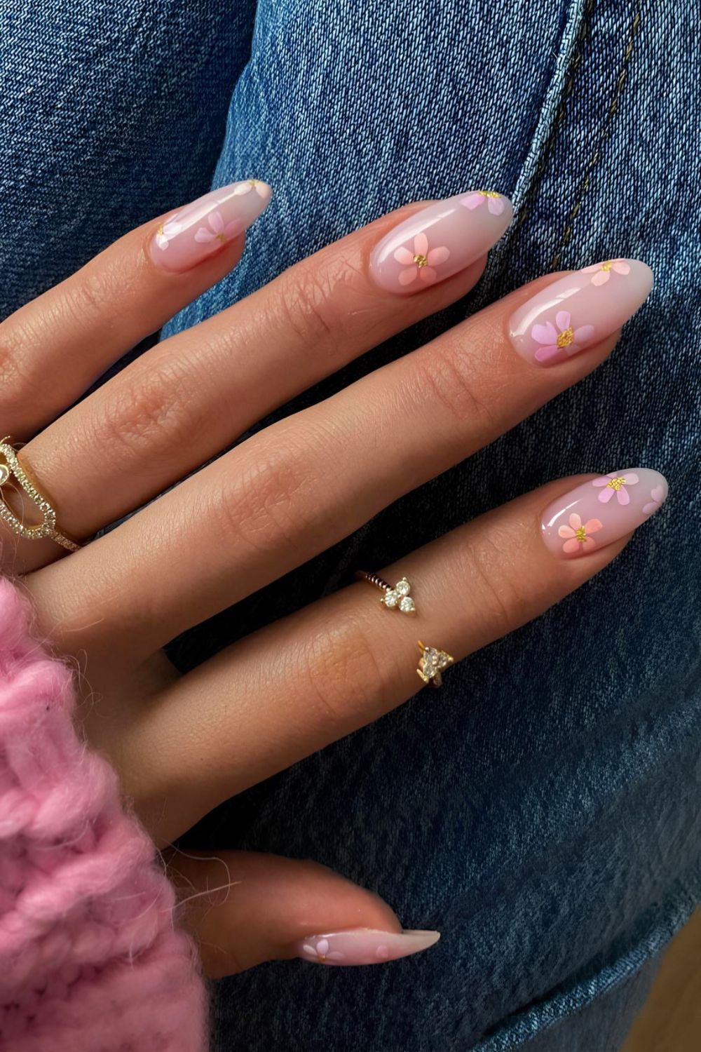 Milky nails with pink and orange flowers