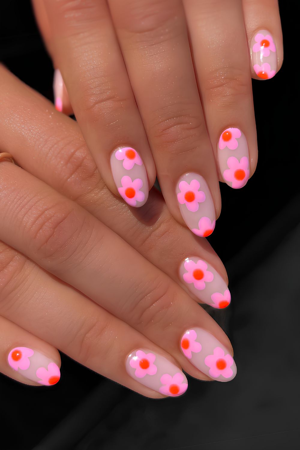 Milky nails with pink and orange flowers
