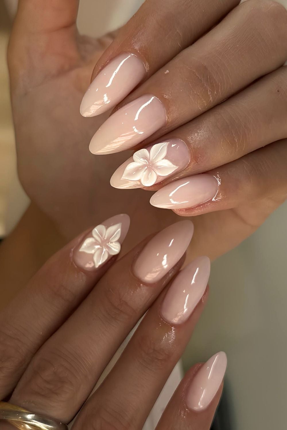 Milky nails with sculpted florals
