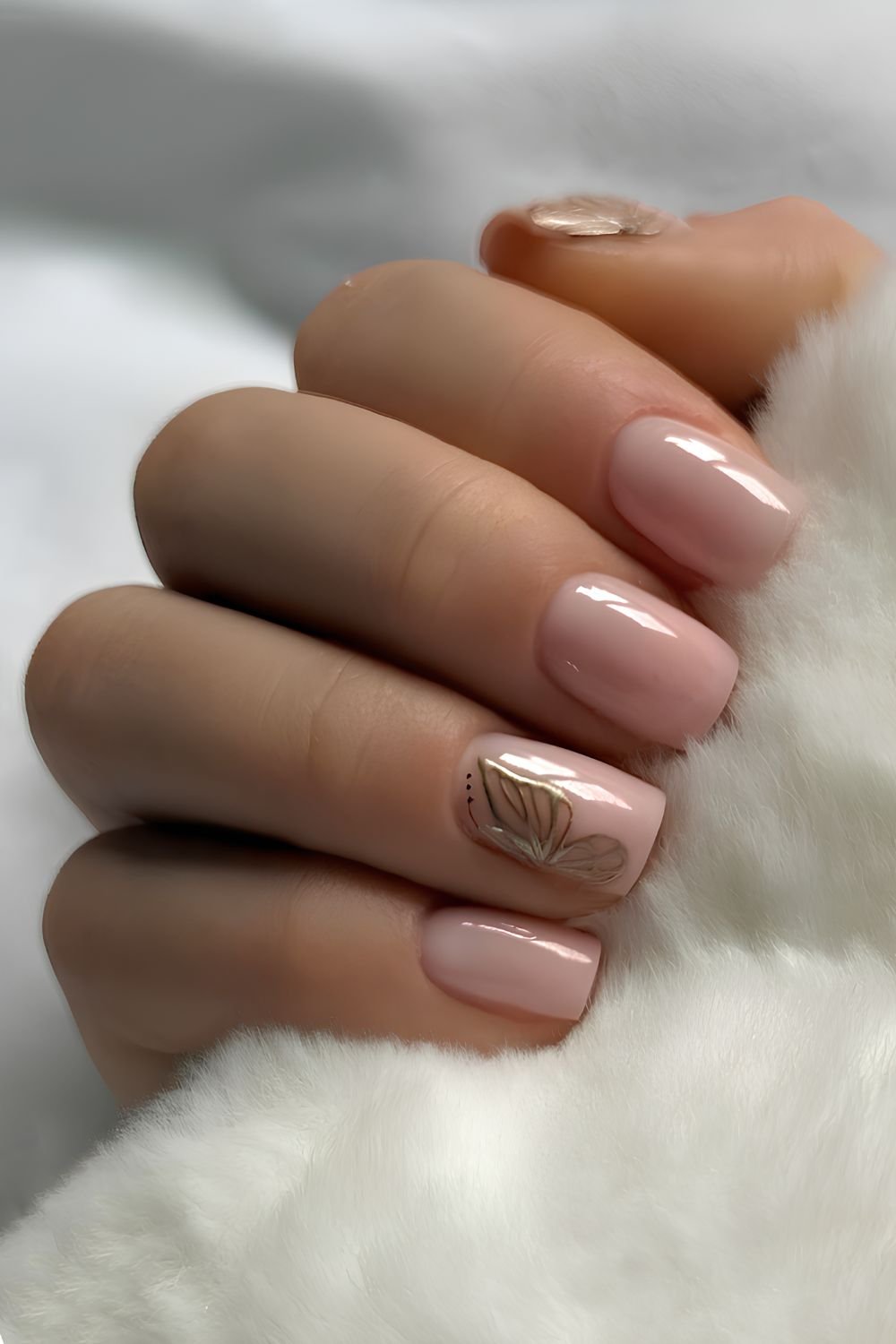 Milky pink mani with gold butterfly art
