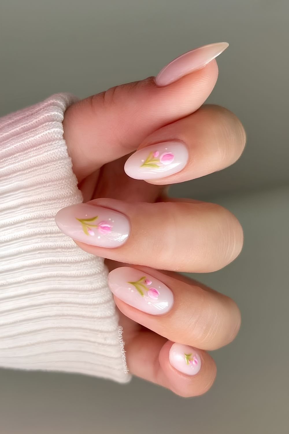 Milky white nails with pink tulips