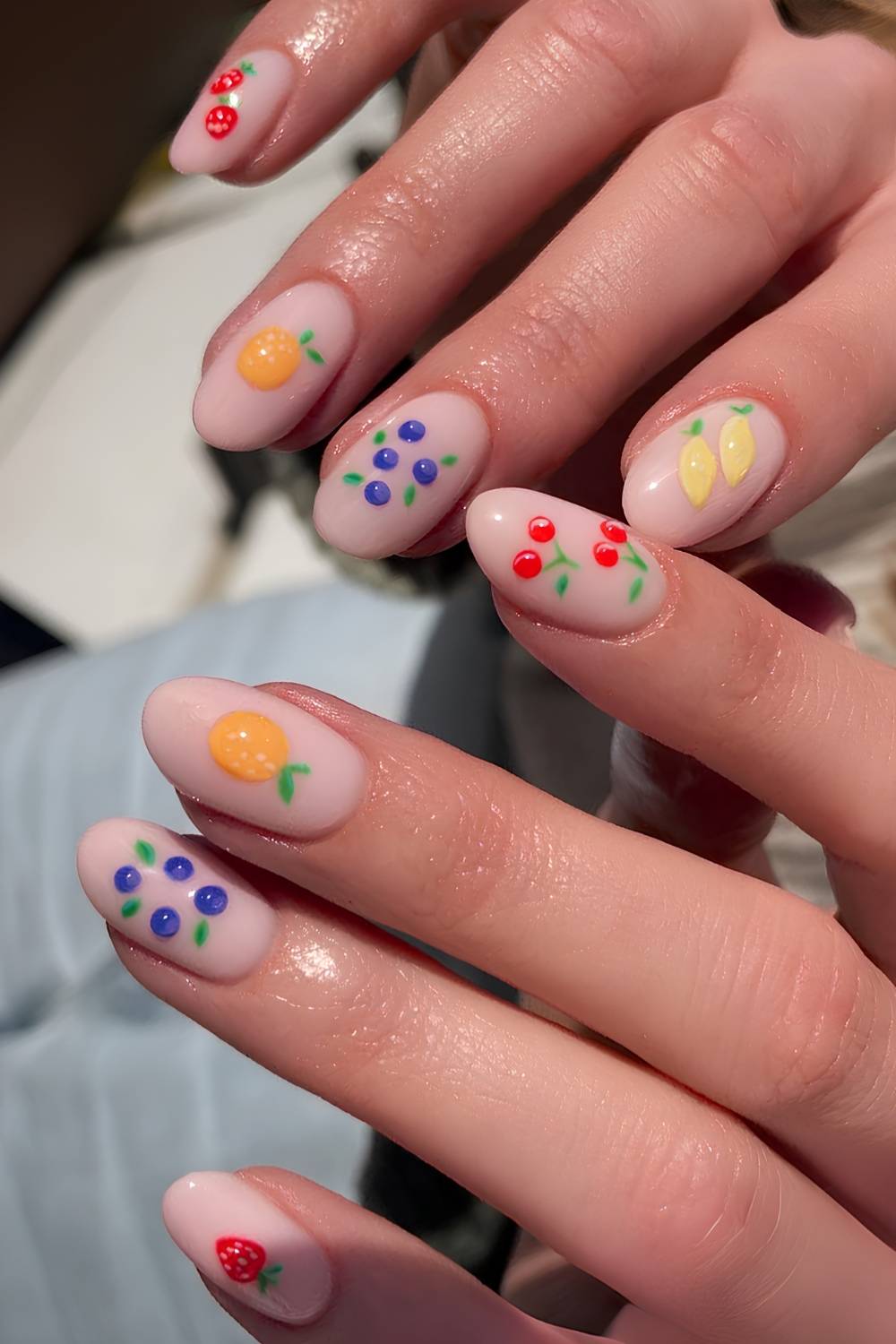 Milky white nails with textured fruit art