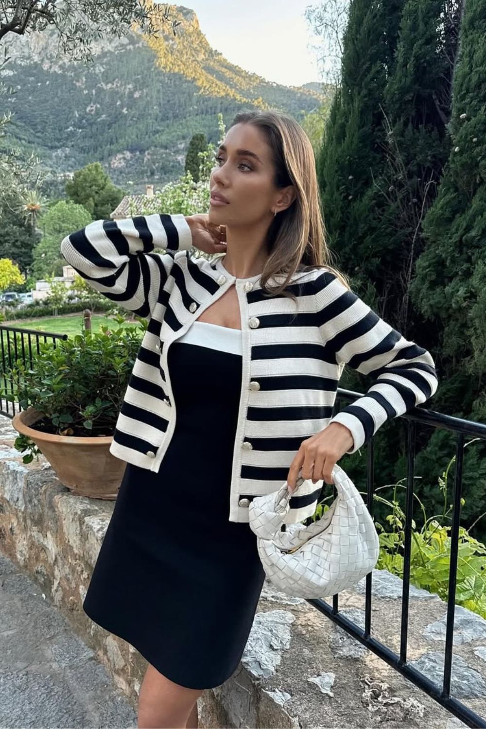 Mini black dress and stripped cardigan