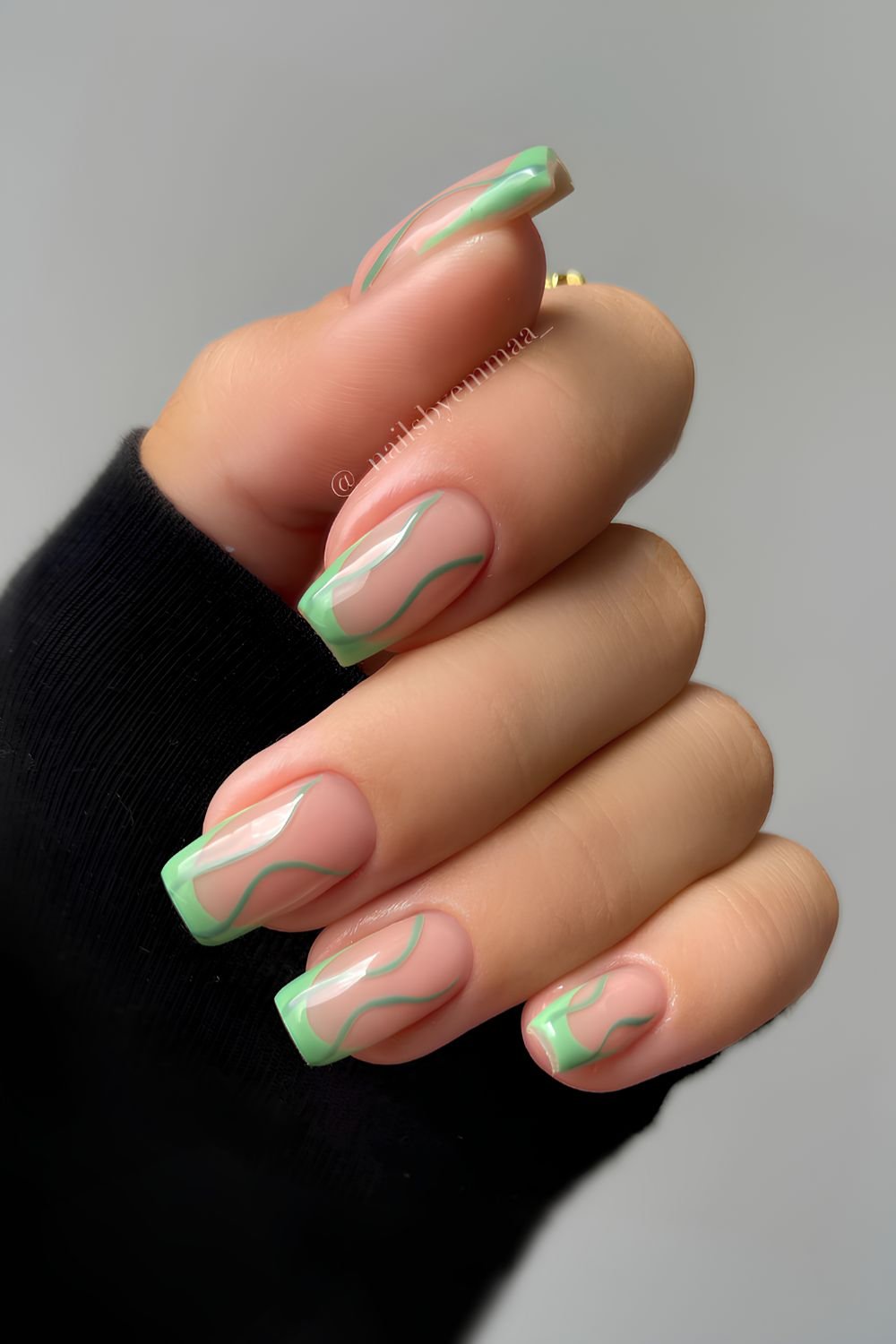 Mint green French mani with swirls