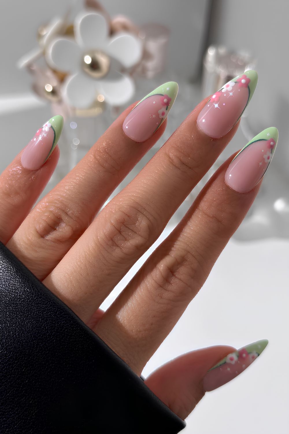 Mint green French nails with pink flowers