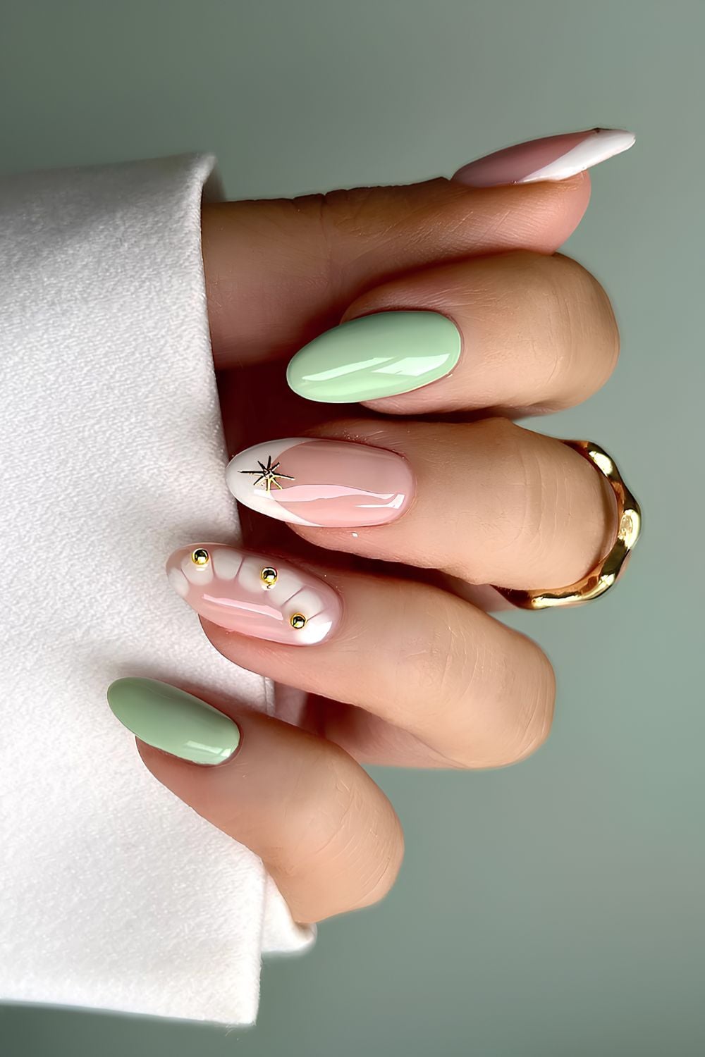 Mint green and white mani with animal print and gold details