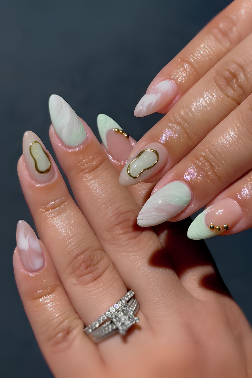 Mint green marble nails with gold details