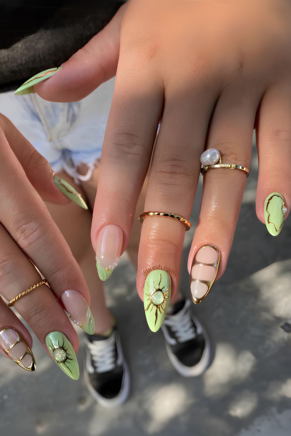 Mint green nails with gold chrome accents