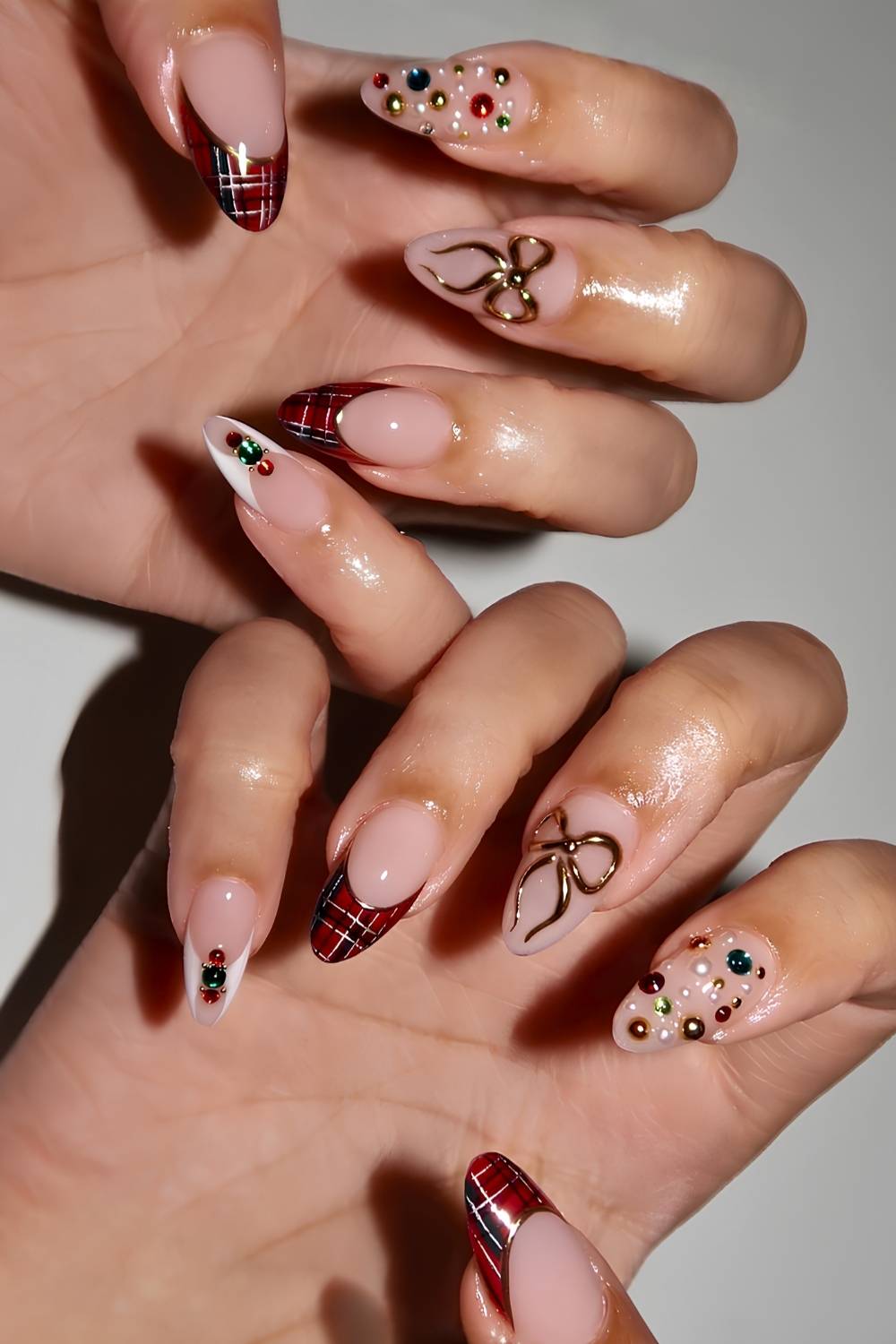 Mismatched Christmas French nails with plaid and bows