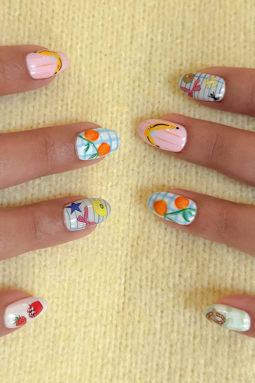 Mismatched nails with fruits and bows