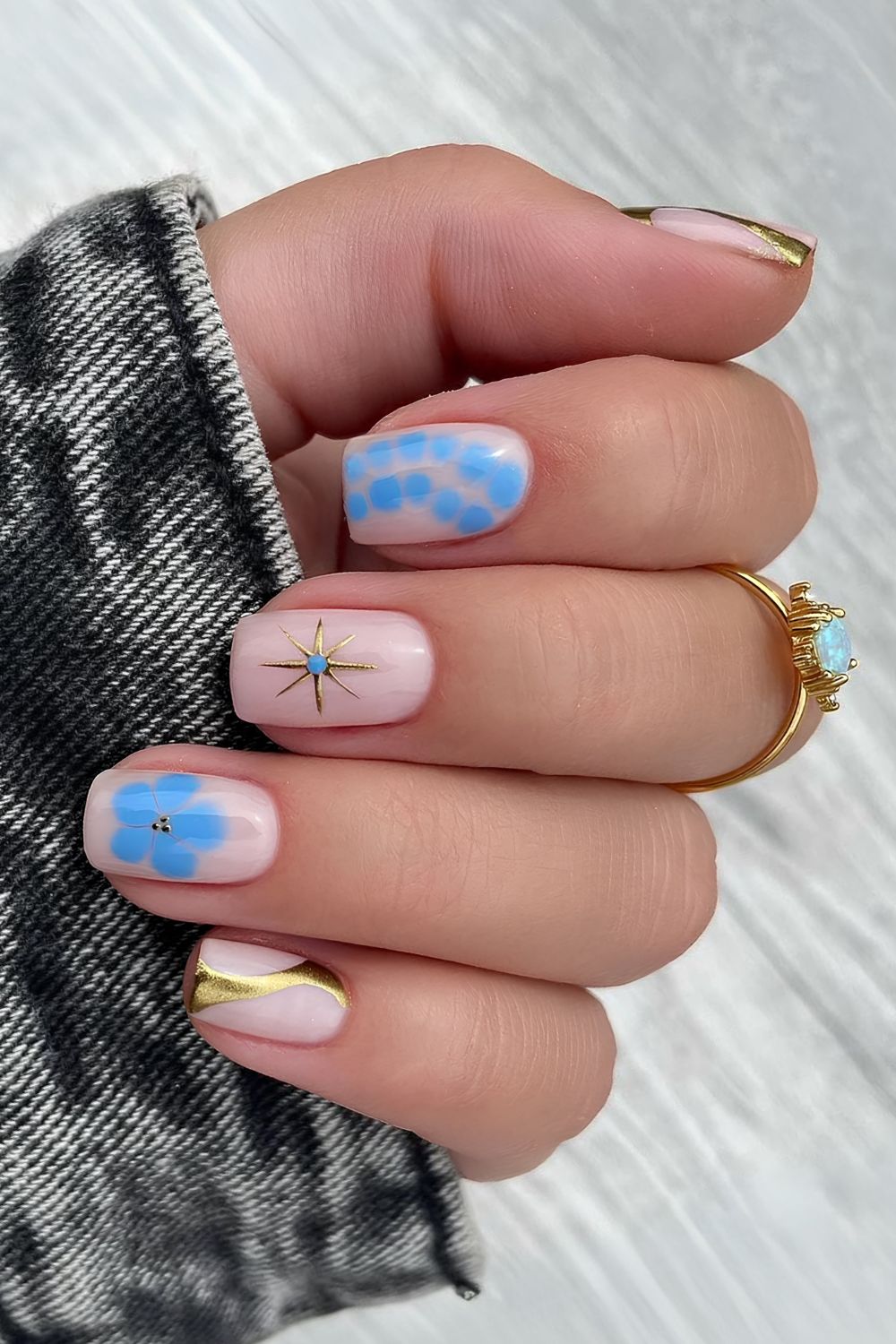 Mix and match nails in blue, milky pink and chrome accents