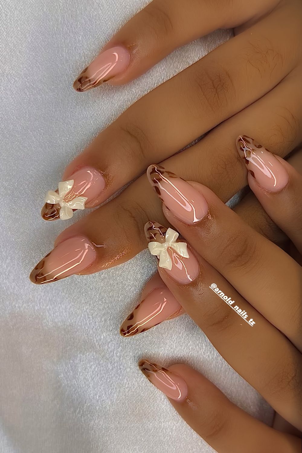 Mocha mousse french tips with animal print and 3D bows