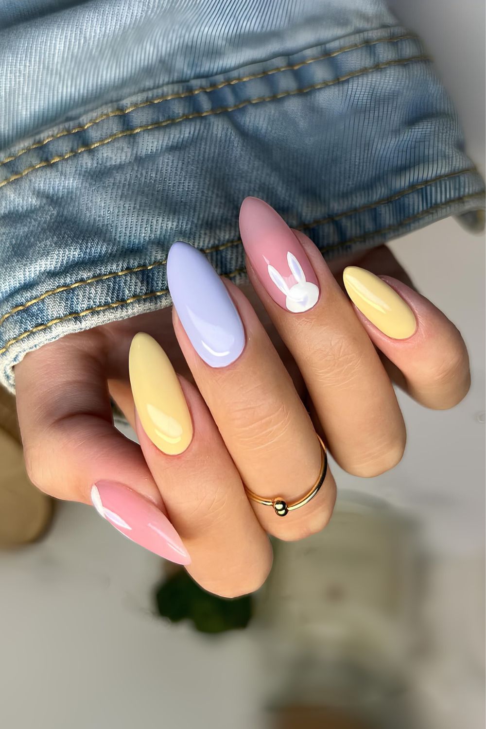 Multicolored pastel nails with easter bunny accents
