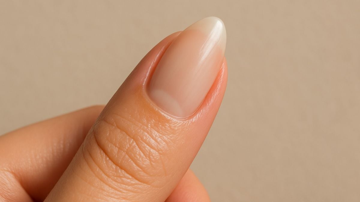 Natural almond nail with oiled cuticles