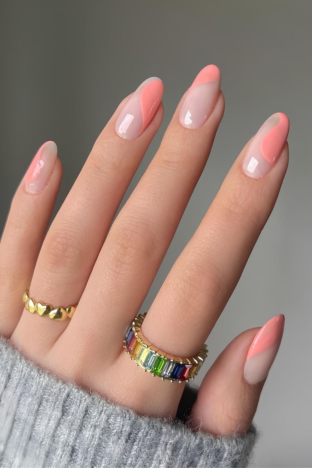 Natural glowy nails with peachy pink swirls and negative space