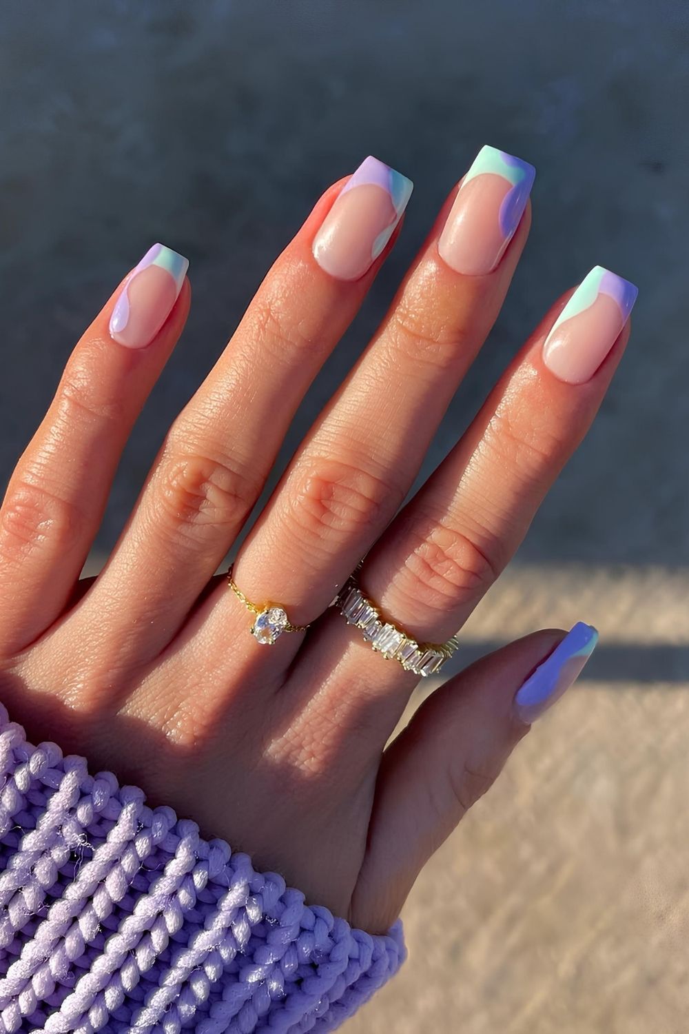 Natural nails with purple and blue abstract tips