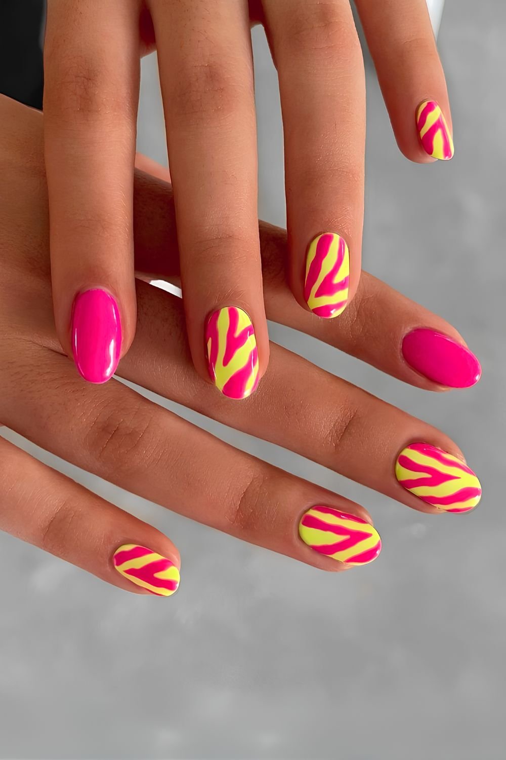 Neon pink mani with zebra print