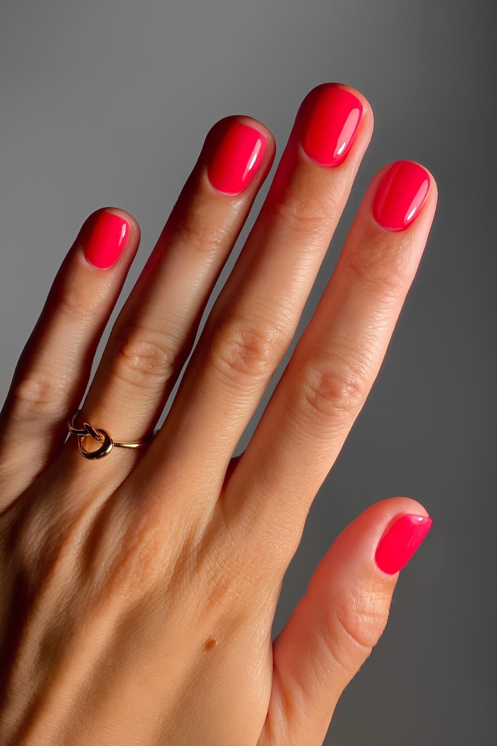 Neon pink short nails