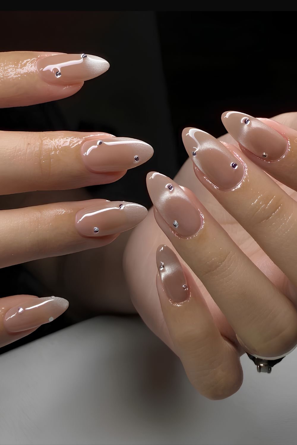 Neutral cat eye nails with rhinestones