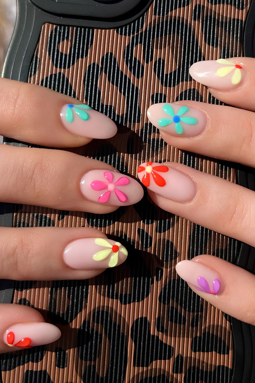 Neutral nails with chunky 3D flowers