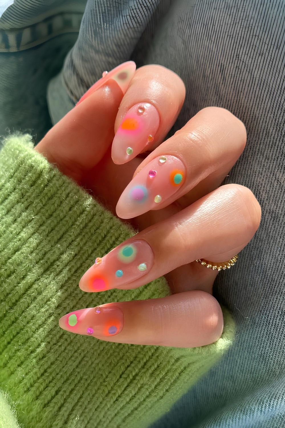 Neutral nails with colorful gems