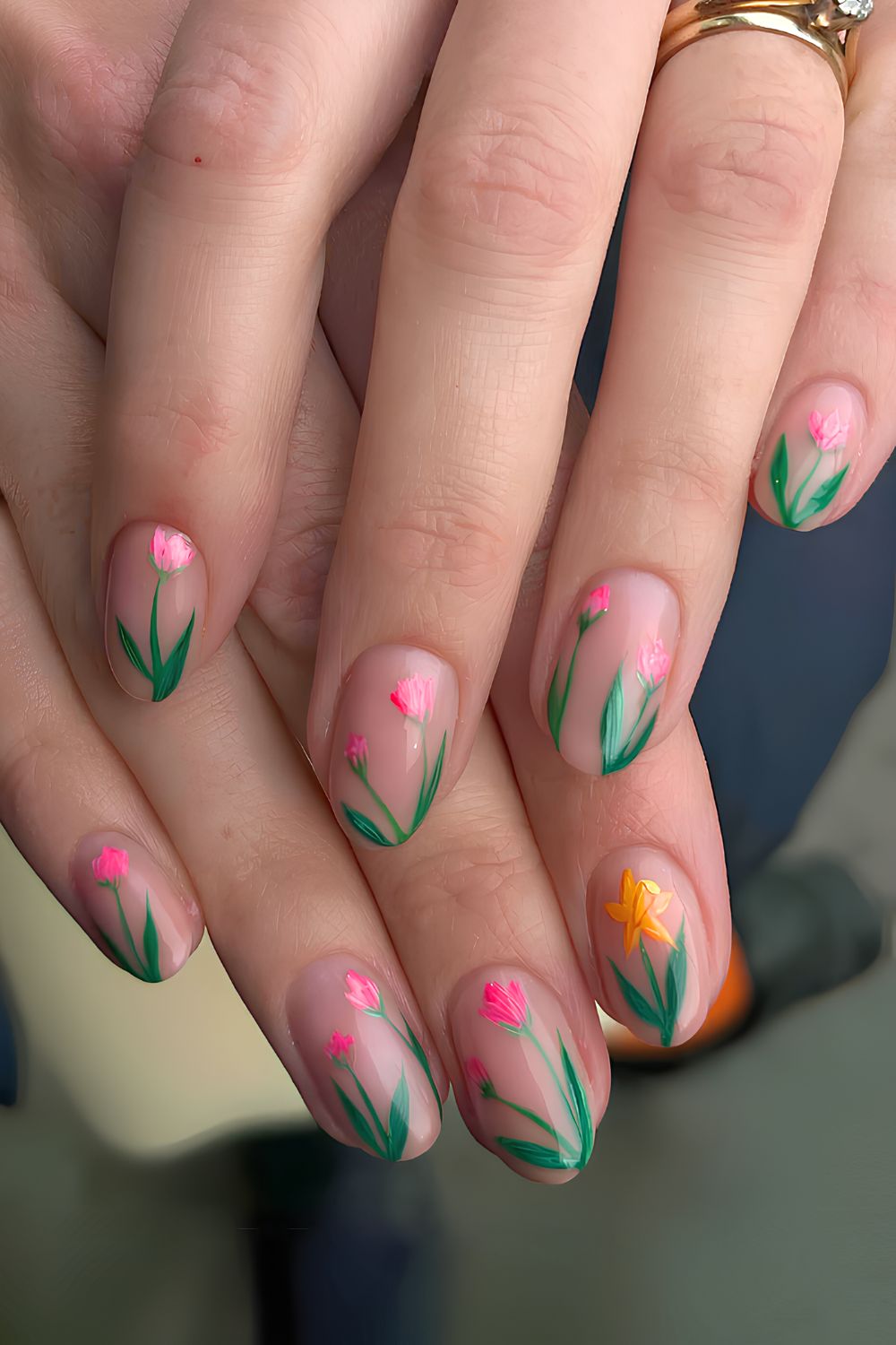 Neutral nails with pink and yellow tulips