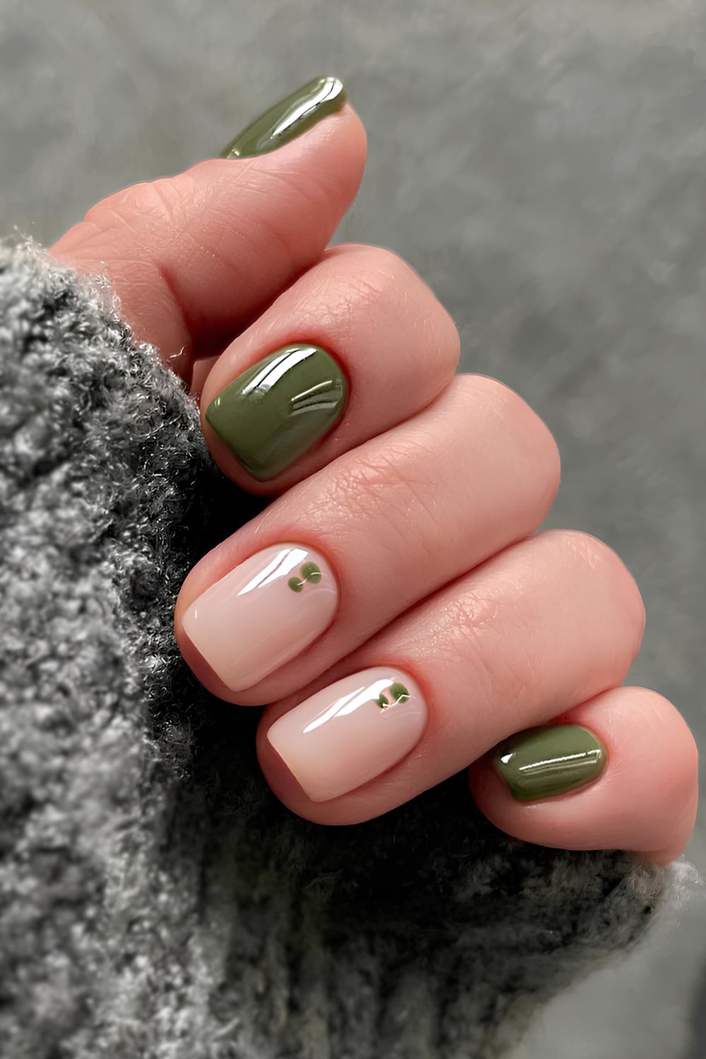 Olive green manicure with dot accents