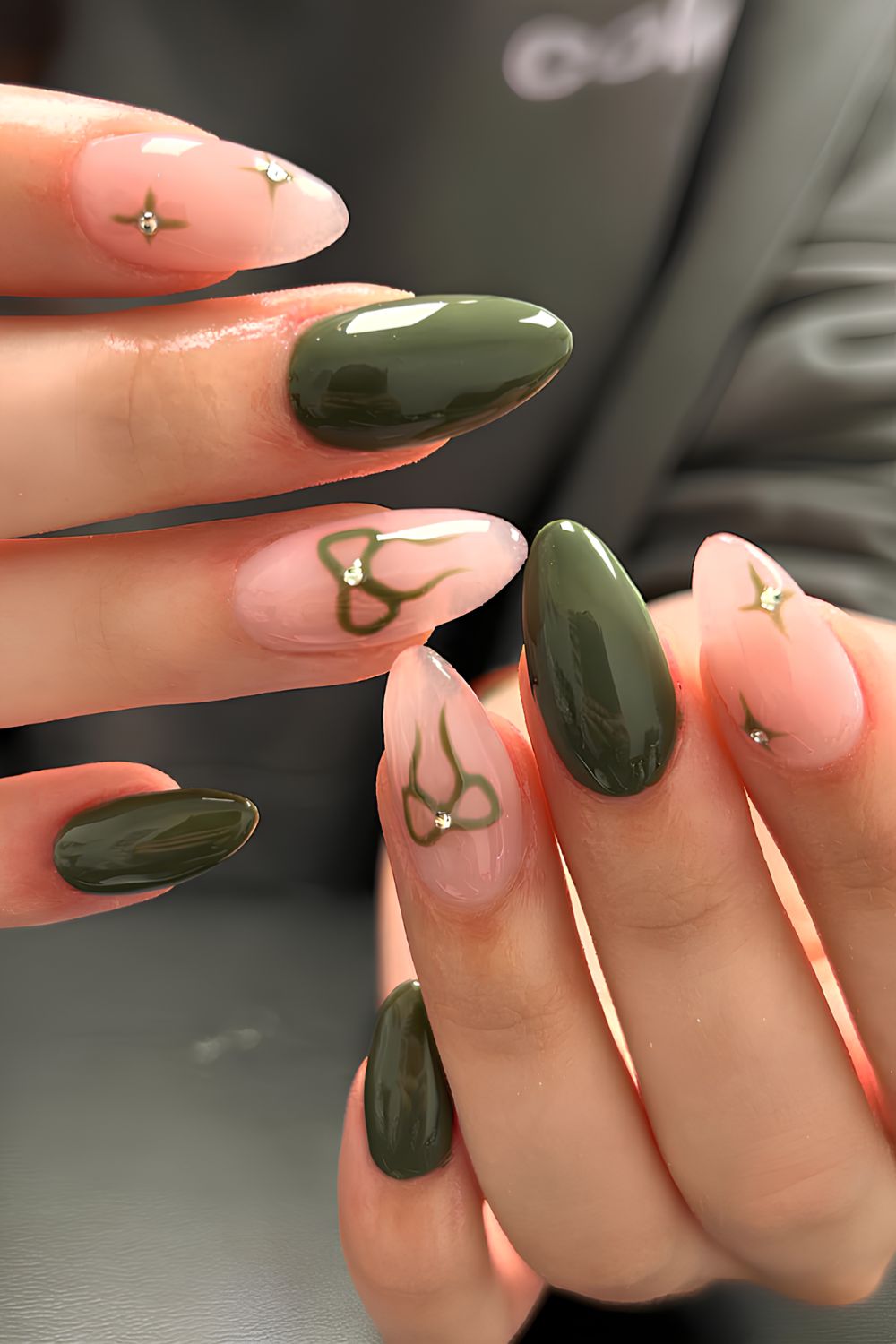 Olive green nails with bows and gems